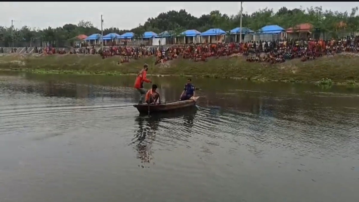 শিবগঞ্জের পাগলা নদী থেকে মরদেহ উদ্ধার করে পুলিশ। ছবি- রূপালী বাংলাদেশ