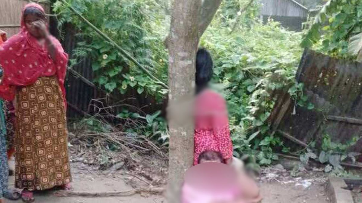 হাতেনাতে আটক প্রেমিক-প্রেমিকাকে গাছের সঙ্গে বেঁধে রাখা হয়েছে। ছবি- সংগৃহীত