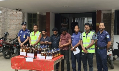 যাত্রীবাহী বাস থেকে ৬৩ বোতল ভারতীয় মদ জব্দ