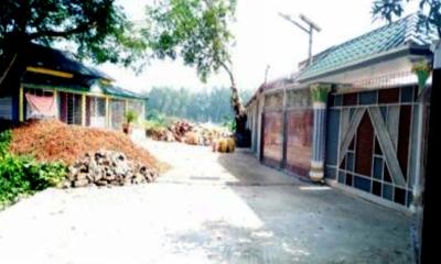 মন্দির শ্মশানের জমি দখল করে সাবেক এমপির বিলাসবহুল বাংলো বাড়ি