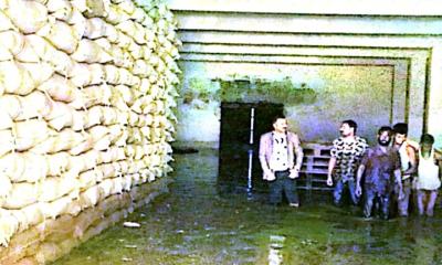 পাহাড়ি ঢলের পানি থেকে রক্ষা পায়নি গুদামে মজুত চাল