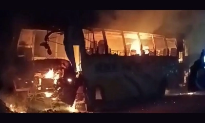 ফরিদপুরে জব্দকৃত বাসে আগুন
