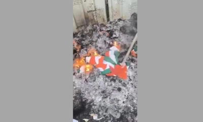 আবর্জনার স্তূপে পোড়ানো হলো ভারতের পতাকা