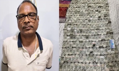 ভয়ে জানালা দিয়ে টাকা ফেলে দিলেন সরকারি কর্মকর্তা 
