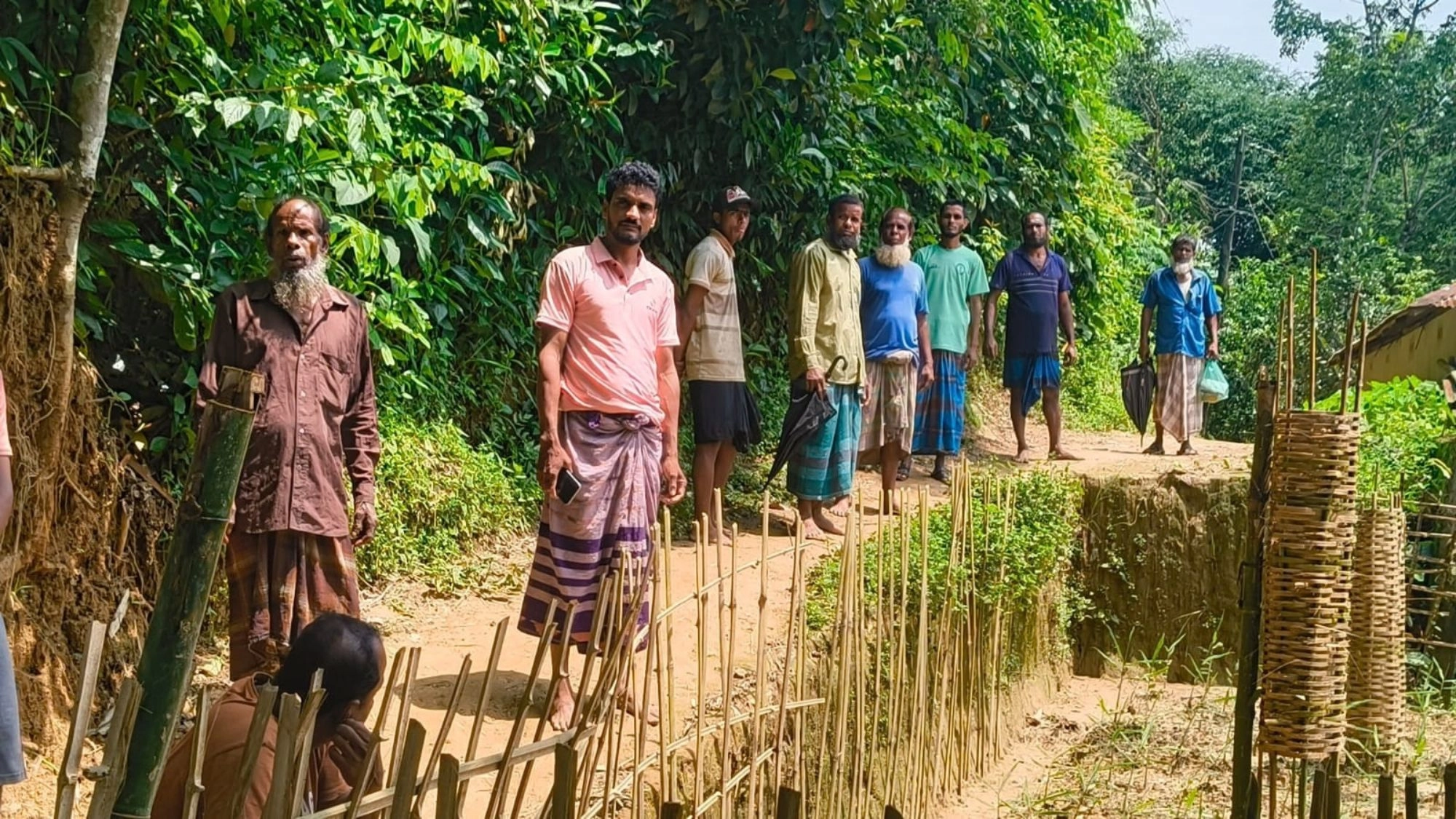 ৬০ বছরের পুরোনো রাস্তা কেটে প্রতিবন্ধকতা