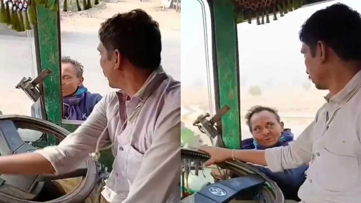 ট্রাকে ঝুলছেন চাঁদাবাজ। ছবি- সংগৃহীত
