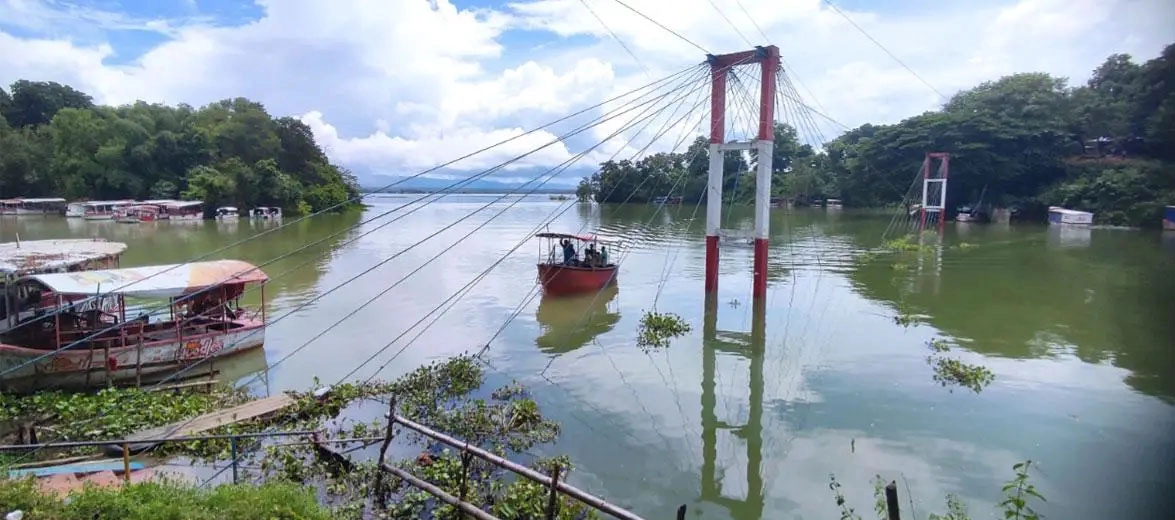 দেড় মাস ধরে পানির  নিচে ঝুলন্ত সেতু