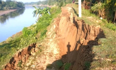 বেপরোয়া বালু উত্তোলনে মনু নদের বাঁধে ভাঙন