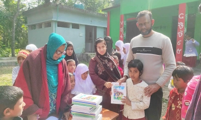 শোকের আবহে শিক্ষার্থীদের হাতে নতুন বই 