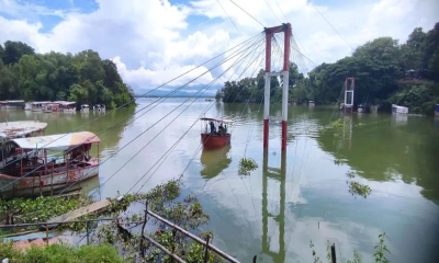 দেড় মাস ধরে পানির  নিচে ঝুলন্ত সেতু