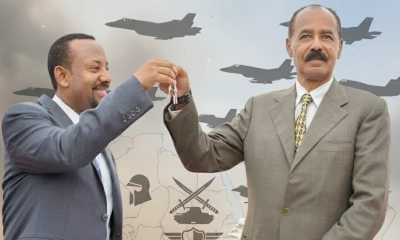 ইথিওপিয়ার প্রধানমন্ত্রী আবি আহমেদ, বামদিকে ইরিত্রিয়ান প্রেসিডেন্ট ইসাইয়াস আফওয়ারকি। ছবি - সংগৃহীত