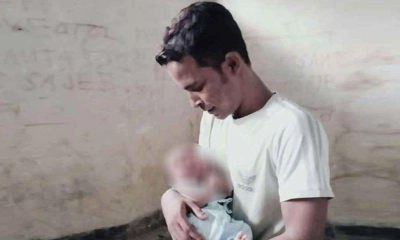 হাজতখানায় শিশু কোলে নিষিদ্ধ ছাত্রলীগ নেতার ছবি ভাইরাল