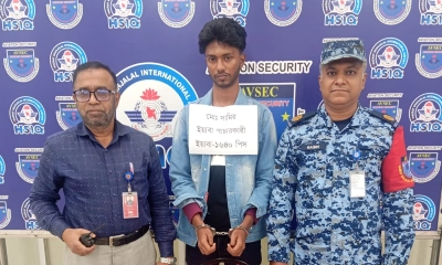 আইনশৃঙ্খলাবাহিনীর হেফাজতে আটক ব্যক্তি। ছবি- রূপালী বাংলাদেশ গ্রাফিক্স