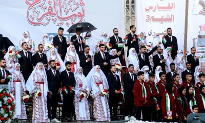 যুদ্ধের ক্ষত নিয়েও নতুন জীবনের স্বপ্ন, গাজায় ৫৪ দম্পতির গণবিয়ে