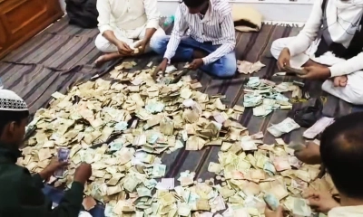 চলছে টাকা গণনা। ছবি- সংগৃহীত