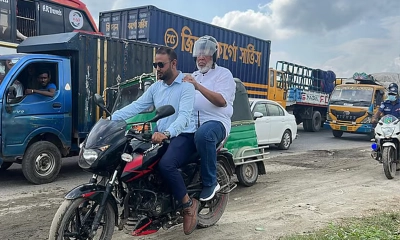 দীর্ঘ সময় যানজটে আটকা পড়ে তিন ঘণ্টা পর মোটরসাইকেলে সরাইল বিশ্বরোড মোড়ে যান উপদেষ্টা।   ছবি - সংগৃহীত