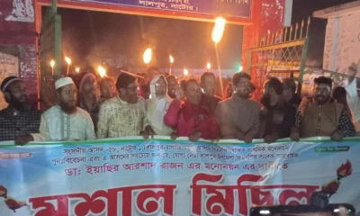 নাটোরের লালপুরে পুতুলের প্রার্থিতা বাতিলের দাবিতে লালপুরে মশাল মিছিল