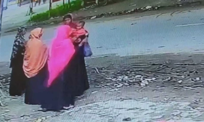 সিসিটিভি ক্যামেরার ফুটেজে বোরখা পরা নারী।     ছবি- সংগৃহীত