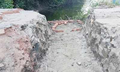 রাতের আঁধারে নবনির্মিত সড়কের ইট-বালু লুট