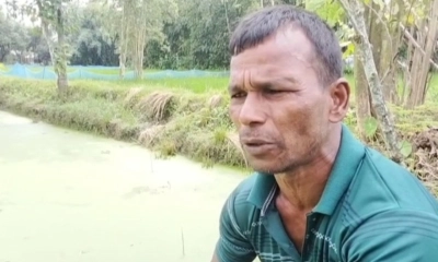 ক্ষতিগ্রস্ত চাষি মোস্তফা কামাল পুকুরপাড়ে। ছবি- ‍রূপালী বাংলাদেশ