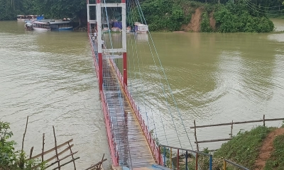 পানিতে ডুবে গেছে রাঙামাটির ঝুলন্ত সেতু