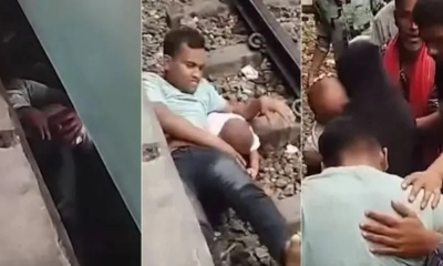 ছেলেকে বাঁচাতে ট্রেনের নিচে ঝাঁপ, বিশ্বজুড়ে ভাইরাল বাংলাদেশি ভিডিও