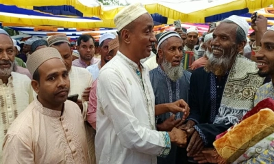 ঈদের নামাজ শেষে কুশল বিনিময় করলেন আইনমন্ত্রী