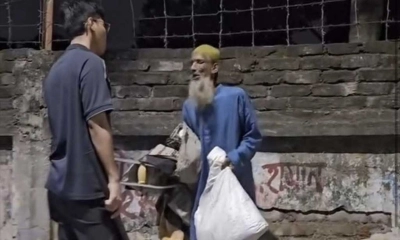 গভীর রাতে লাঠি হাতে বৃদ্ধকে শাসালেন সর্বমিত্র, তীব্র সমালোচনা