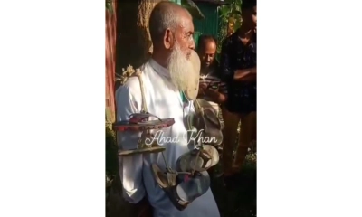 মুক্তিযোদ্ধাকে গাছে  বেঁধে জুতার মালা  পরিয়ে নির্যাতন