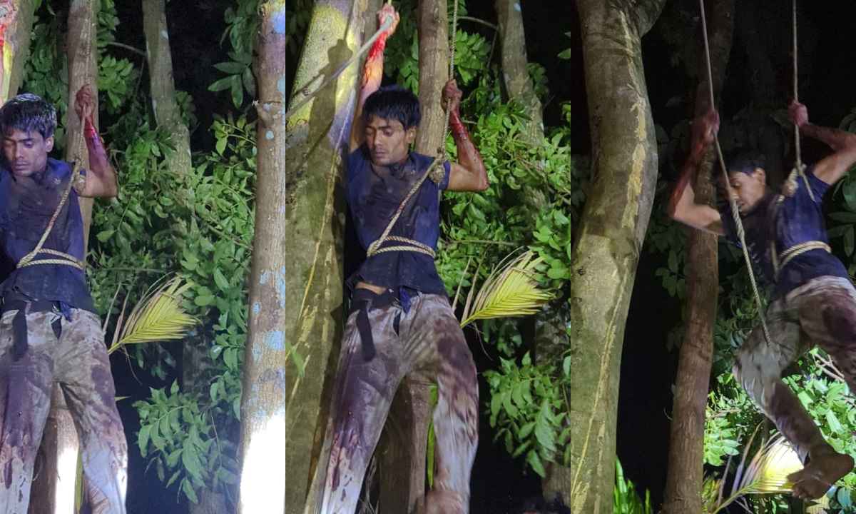 পুলিশ স্থানীয় ও ফায়ার সার্ভিসের সহযোগিতায় রাত ১০টার দিকে ৪ ঘণ্টার শ্বাসরুদ্ধকর অভিযান চালিয়ে গাছ থেকে নামিয়ে গ্রেপ্তার করে। ছবি- রূপালী বাংলাদেশ