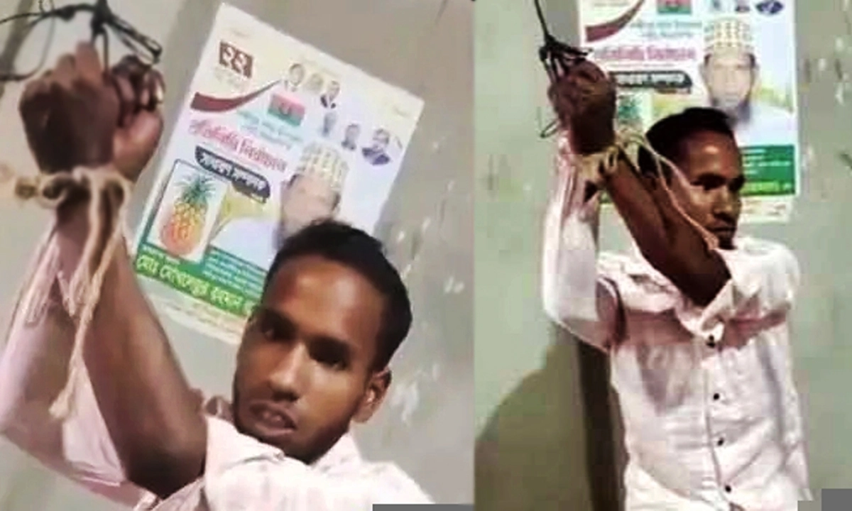 দড়ি দিয়ে এক শ্রমিকের হাত বেঁধে রাখা হয়েছে ঘরের আঁড়ার সঙ্গে। ছবি : রূপালী বাংলাদেশ