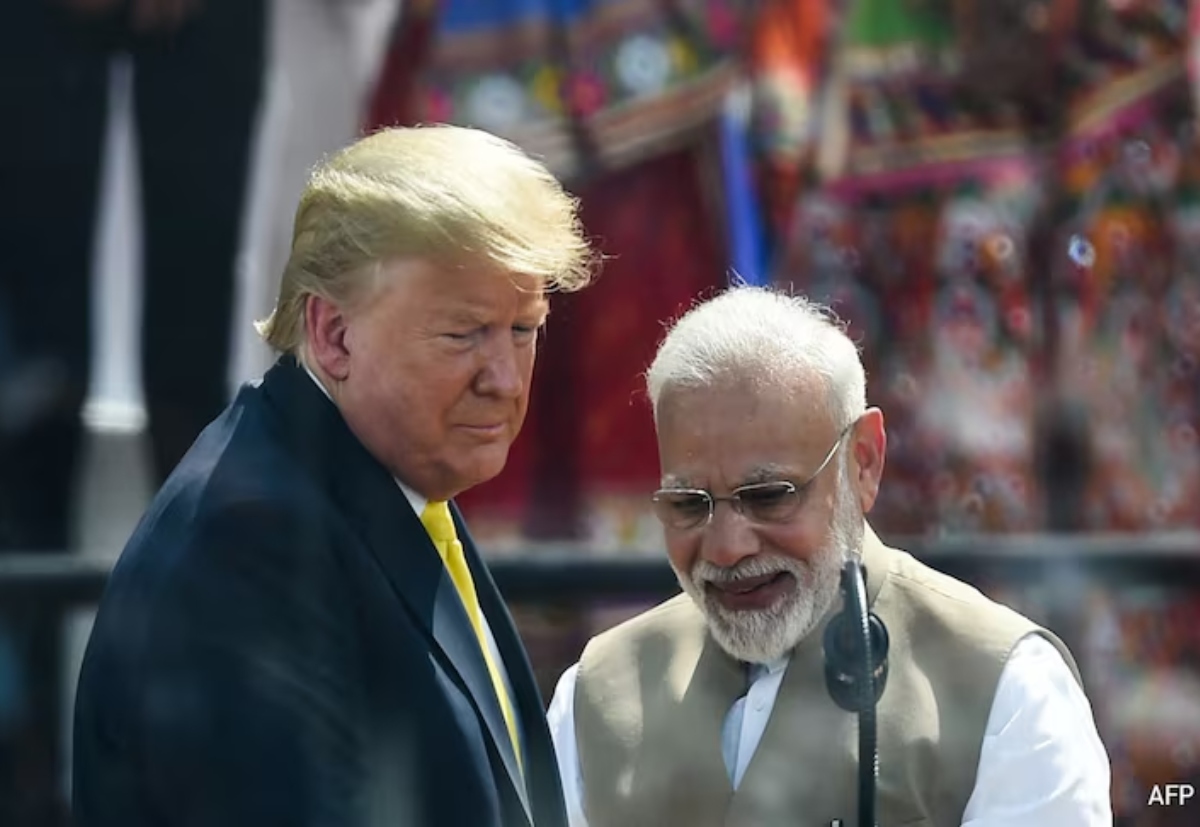 ট্রাম্পের সঙ্গে মোদি। ছবি : এএফপি