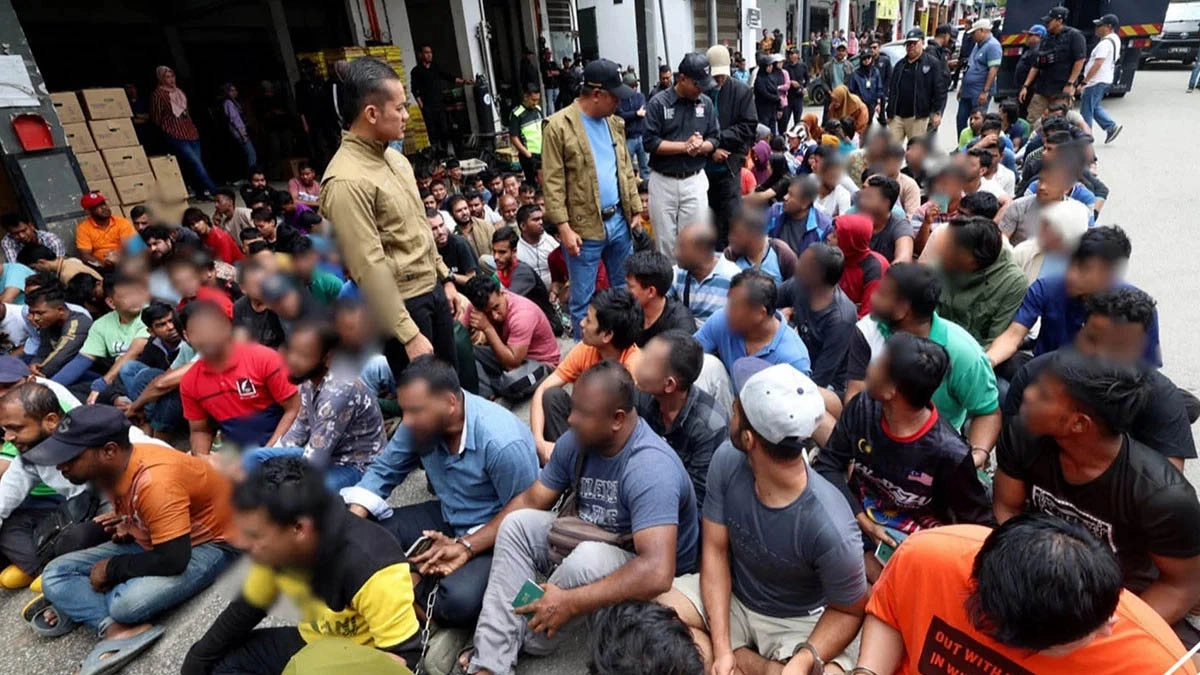 আটককৃত অভিবাসী । ছবি- সংগৃহীত